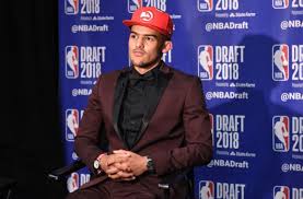 Trae young channels ac/dc with suit shorts at nba draft. Is Trae Young Recruiting Lebron James To The Hawks