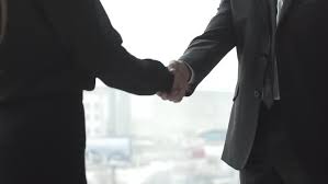 Business people shaking hands together. Business Man And Business Woman Stock Footage Video 100 Royalty Free 23692069 Shutterstock