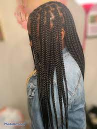 Rather than looping the braiding hair at the root (which creates the knot) braiding hair is added little by little, until the entire section is complete with the knotless technique. Newest Trend Out Knotless Box Braids Box Braids Hairstyles For Black Women Hair Styles Braided Hairstyles For Black Women