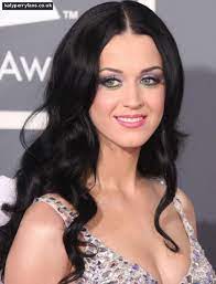 The firework songstress completed the look with gorgeous pearl and diamond drop earrings and rocked her blonde hair in a chic top bun. Katy Perry Katy Perry Hair Katy Perry Hair Color Jet Black Hair