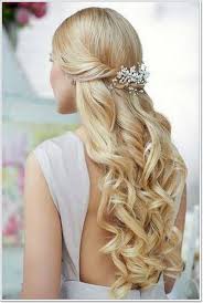 Slanting front bang parted with a crown band and a puffed up braided top. 135 Whimsical Half Up Half Down Hairstyles You Can Wear For All Occasions