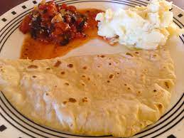 Mom Made Local Breakfast Food For Me One Day It S Sada Roti Which Is A Trinidadian Flat Bread And Is Eaten With Many Different Food Caribbean Recipes Recipes