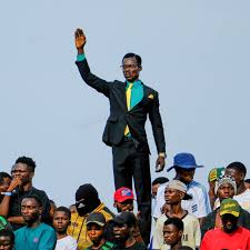 Congolese fan Michel Kuka Mboladinga as Lumumba Vea