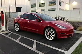 The steering wheel and the prominent center. Tesla Model 3 With White Seats And Dual Motor Awd Could Come In July Says Elon Musk