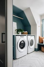 Laundry Room Cabinet Paint Color Green Gray Laundry Room Cabinet With Herringbone Floor Tile Laundry Grey Laundry Rooms Herringbone Floor Laundry Room Cabinets