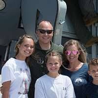 Hull Technician 2nd Class Holly Gardner, left, explains how to don an  Advanced Chemical Protective Garment (ACPG) as Personnel Specialist 3rd  Class Shantrail Robinson demonstrates for a group of Sailors aboard USS