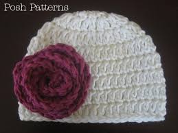 This flower beanie looks pretty with a background of this duck egg blue, a soft pink or a soft green. Easy Crochet Hat Pattern Flowers Leaves Bow Patterns