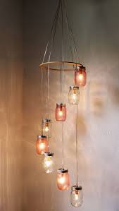 Do you love mason jars?here you have a single half gallon jar with a rust cage and the bottom cut out. Turning Mason Jars Into Light Fixtures