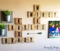 Hanging a large mirror on the wall just above a bench is another trend that looks great and is easy to pull off. Diy Scrabble Wall Tiles Rustic Wood Wall Decor For Your Home