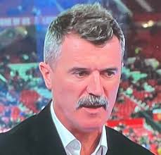 Roy Keane looking like he wants pictures of Spider-Man
