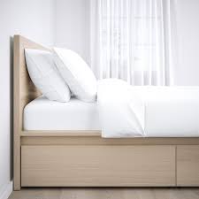 A queen platform bed frame with storage allows for easy organization in small bedrooms. Malm Bettgestell Hoch Mit 2 Schubkasten Eichenfurnier Weiss Lasiert Ikea Schweiz In 2020 Malm Bed Frame High Bed Frame Malm Bed