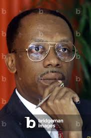 Image of Haitian presidential candidate Jean-Bertrand Aristide holds a  press conference in