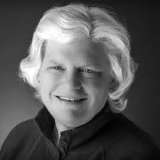 A week ago, my beat up silver badge got replaced by a very sparkly 25 Year  gold badge!