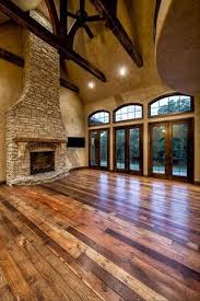 Amazing Color Variation Within The Wood Floor Planks The Stone Chimney Is Also A Very Beautiful Touch My Dream Home House Design Dream House