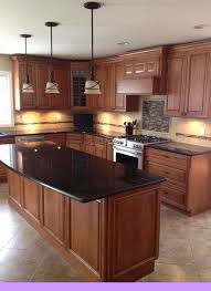 Dark Light Oak Maple Cherry Cabinetry And Reclaimed Wood Kitchen Cabinet Kitchen Remodel Countertops Black Quartz Kitchen Countertops Contemporary Kitchen