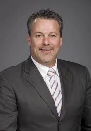 Minister Holland Understands Company's Financial Predicament