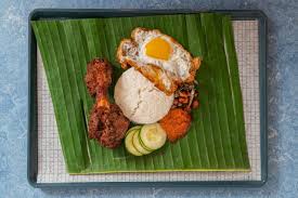 Coconut infused rice served with choice of rendang, sambal ikan bilis, peanuts, & fresh cucumber. Return Of Lemak
