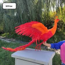 Associated with the sun, a phoenix obtains new life by arising from the ashes of its predecessor. Huge Real Life Red Orange Phoenix Model Foam Feather Simulation Wings Phoenix Bird Gift About 120cm Xf1016 Figurines Miniatures Aliexpress
