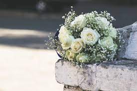 Floral arches at the top of your aisle make a beautiful backdrop for exchanging your vows. 13 Beautiful Wedding Flowers Their Meanings North West Brides