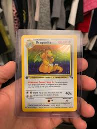 A card bearing a first edition mark. Anyone Know If It S Worth Much 1st Edition Holo Foil Dragonite Fossil Set Pokemoncardcollectors