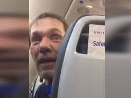 'This is not Trump's America!': Passengers rejoice when man accused of  racism is kicked off flight