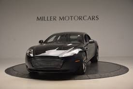 Image result for Marron Black 2017 Aston Martin