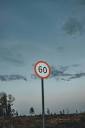 A Speed Limit Sign by the Road · Free Stock Photo