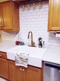 Apply grout with a rubber float working diagonally across the tile. Newbie Diy Subway Tile Backsplash Hometalk