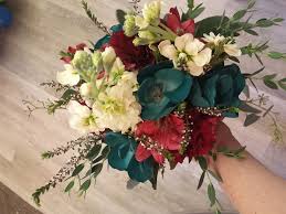 Burgundy And Teal Bouquet Featuring Teal Permanent Flowers Cream Stock Burgundy Alstromeria And Sterl Teal Bouquet Teal Wedding Flowers Prom Flowers Bouquet