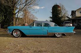 Image result for Turquoise 1958 Cadillac