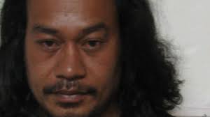 Alleged kidnapper found in Dededo tree