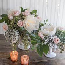 If your a bride on a budget then diy centerpieces will no doubt be your best friend! Diy Crepe Paper And Fresh Flower Centerpieces