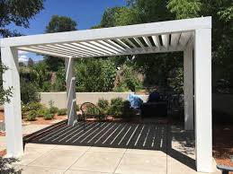 Pergola, garden walk or terrace, roofed with an open framework over which plants are trained. Fiberglass Louvered Pergola Kit Modern Contemporary