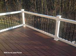 From durables vinyl railing to illusions vinyl railing, keep your deck railing design stunning. Wolfbuilding Pvc Deck White Pvc Railing With Black Square Aluminum Balusters Patio Railing Railings Outdoor Deck Railings