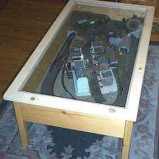 Arriving soon from a simpler time, the railcar is your destination for refreshments in the stockyards. How To Make A Train Coffee Table Model Train Table Model Trains Glass Top Coffee Table