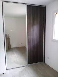 portes coulissantes composees d un ventail en melamine egger chene highland et d un autre en miroir une piece home decor home furniture