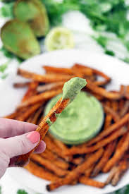 It's spiked with fresh basil, which complements the sweet potato fritters really well. Crispy Baked Sweet Potato Fries With Avocado Cilantro Sauce Bowl Of Delicious