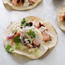 Broil the salmon, skin side down, for 8 minutes, or until it flakes easily with a fork. Salmon Tacos With Cilantro Lime Slaw Cook S Country