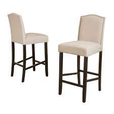 This kitchen counter stool features dense foam padding with a sinuous spring support system for added comfort and support. Noble House Markson 30 In Beige Studded Bar Stool Set Of 2 6618 The Home Depot