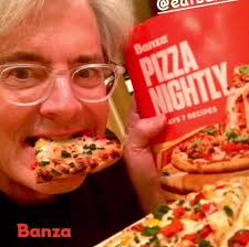 Check out the sign behind Lloyd Gallagher in The Hidden. Yes! It's National  Pizza Week. 🍕 👏 Kyle MacLachlan