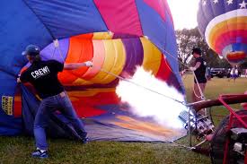 Expect colourful bouncy houses and other fun activities for save the date! Bunte Heissluftballons Uber George Town Groovy Planet