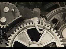 This is a studio backlot / movie set. Charlie Chaplin Swallowed By A Factory Machine Modern Times 1936 Youtube