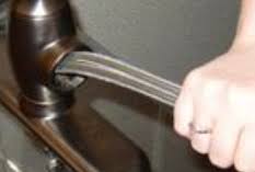 Can anyone assist me in the steps needed to resecure this faucet's spout? Install Valve Body With Hose Assembly For Vinnata Or Clairette Kitchen Faucets Kohler