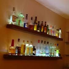 You may want to remove the label and paint or otherwise decorate the bottle, a method often deployed by restaurants. 27 Bottle Display Ideas Bottle Display Bars For Home Bottle