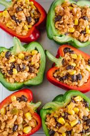 Stuffed with beef crumbles and cheese for only 250 cals and 30g protein for all 3! Healthy Southwestern Stuffed Peppers
