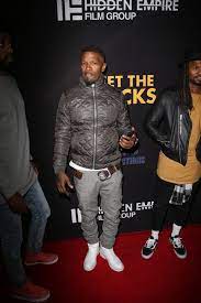 Jamie Foxx Looking Good Wearing Grey Jacket And Trousers And White Boots Gray Jacket Jackets White Boots