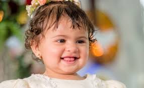 Paulette recibe el primer sacramento