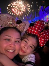 Single mom embracing Disney adventures with love
