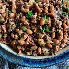 Forget the canned variety—these are easy to make with there's usually one or more varieties of beans, some smoked meat like bacon or ham, sometimes with ground beef, always with a sweet tangy barbecue. Cowboy Beans Baked Beans Recipe With Bacon And Ground Beef