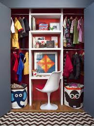 In a small room keep the footprint of the bed small by using a high rise bed. Urban Kids Bedroom By Brian Patrick Flynn Closet With Built In Desk Shared Kids Room Storage Kids Room Kids Room Design